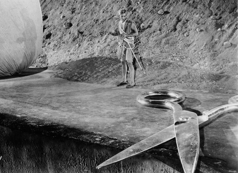 The Incredible Shrinking Man (Universal-International, 1957). Reduced to only a few inches in height due to exposure to a mysterious radioactive mist, John Scott Carey (Grant Williams) struggles to survive when he is trapped in his own basement after being attacked by the family cat. Click to enlarge.