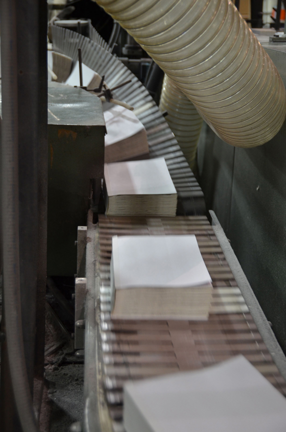 Step by step photos of A Memory of Light being printed at the bindery.