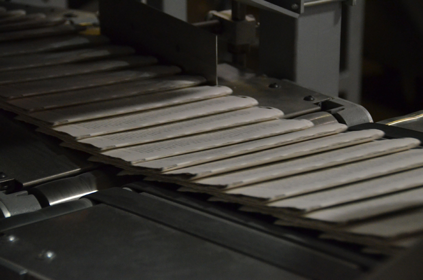 Step by step photos of A Memory of Light being printed at the bindery.