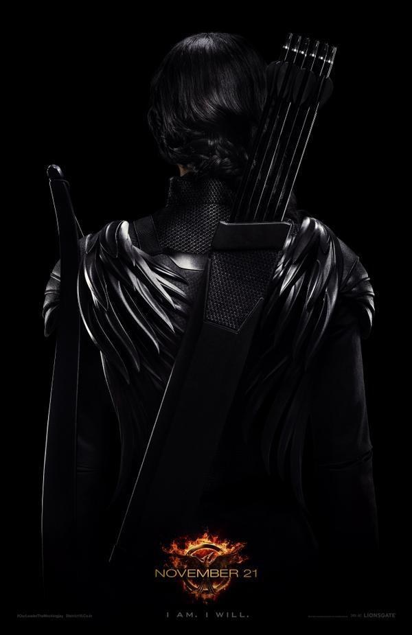new Mockingjay poster Katniss Everdeen Jennifer Lawrence The Hunger Games District 13 rebels Capitol Panem Peeta Mellark President Snow I am I will