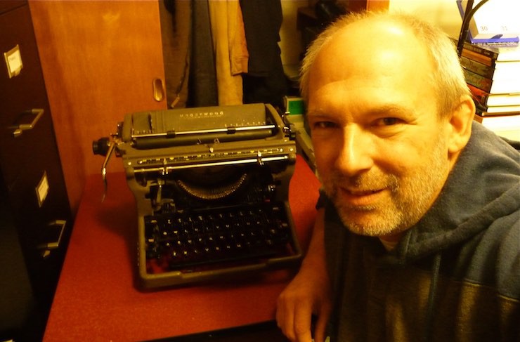 Frederic S. Durbin with his Underwood standard (1951), a present from his wife last Christmas--the first machine in the collection.