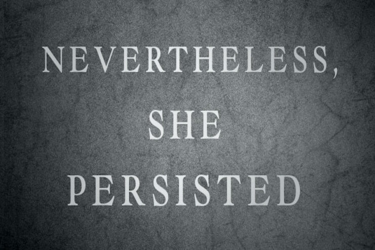 The words "Nevertheless, She Persisted" in white on grey