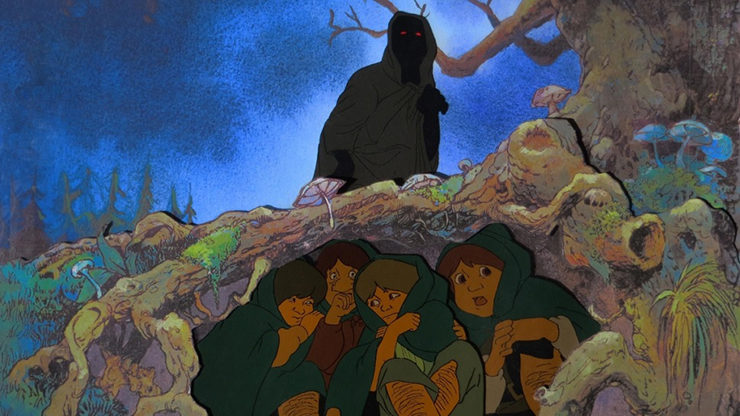 A ringwraith looms over the four hobbits in Ralph Bakshi's animated Lord of the Rings film