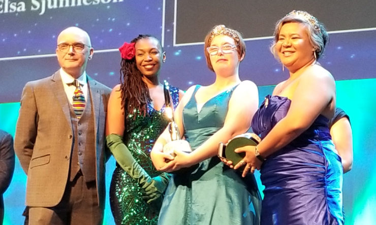 Elsa Sjunneson-Henry and Michi Trota accept the 2019 Hugo Award for Best Semiprozine for Uncanny Magazine’s Disabled People Destroy Science Fiction Special Issue" (Photo: Jonathan Henry)
