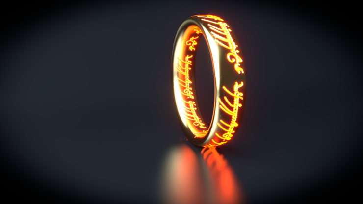 A simple gold ring with fiery letters