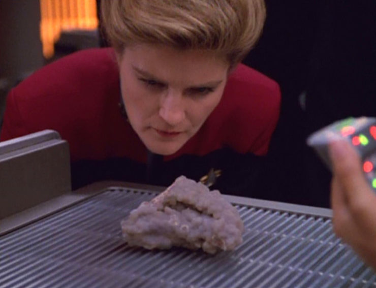 Captain Janeway (Kate Mulgrew) observes the Caretaker alien in Star Trek: Voyager