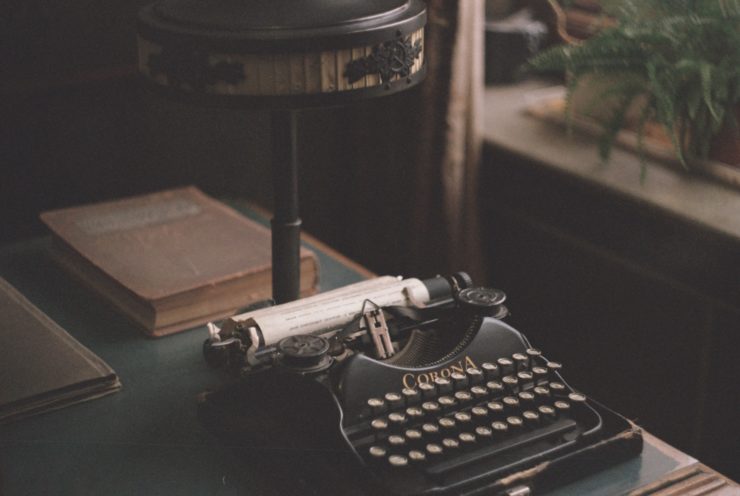 black typewriter on a desk