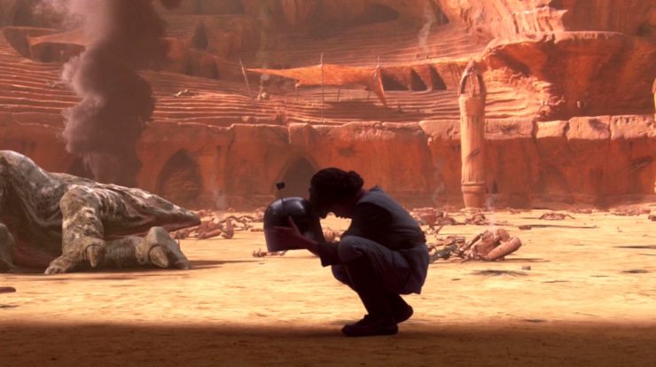 Young Boba Fett holds Jango's helmet in Star Wars: Attack of the Clones