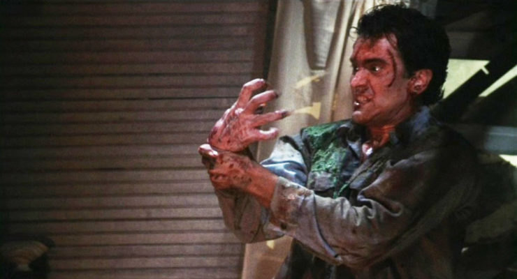 Ash (Bruce Campbell) fights his own demonic hand in Evil Dead II