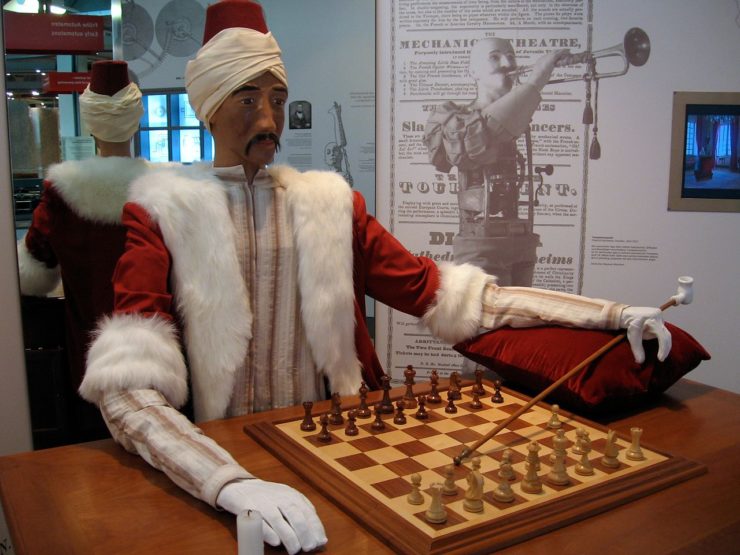 Photograph of a "Mechanical Turk" chess-playing automaton on display at a museum