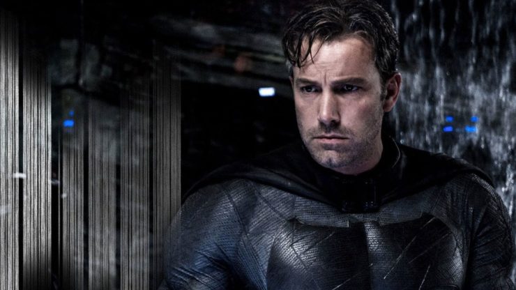 Ben Affleck in batsuit without cowl, frowning