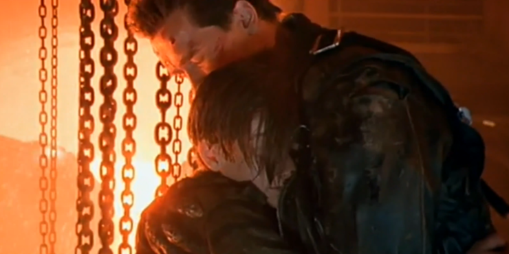 John and the T-800 embrace in Terminator 2