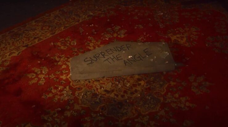 Good Omens 2, a slab on the bookshop carpet, surrounded by broken glass reading "Surrender the angle"