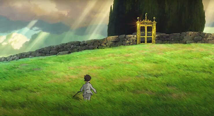 Mahito walks through a field in The Boy and the Heron