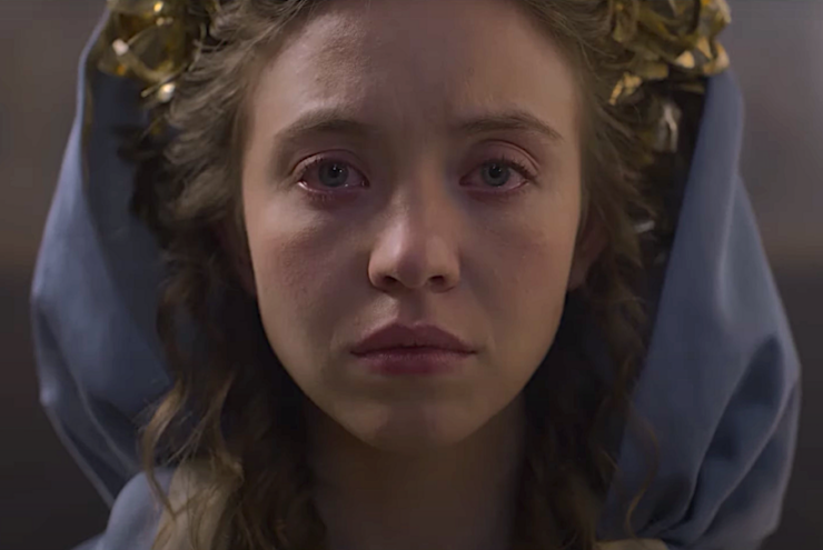 Sydney Sweeney looks into the camera in a scene from Immaculate.
