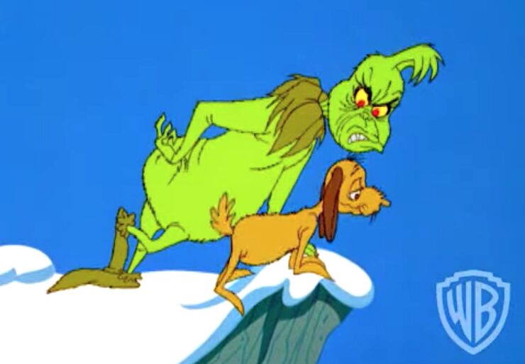 The Grinch glares at his dog, Max in a scene from How the Grinch Stole Christmas.