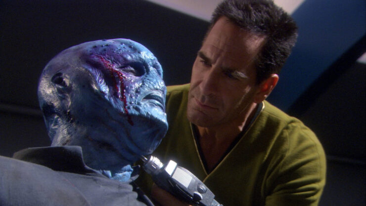 Mirror Universe Captain Archer threatens an Andoran in a screenshot from Star Trek: Enterprise