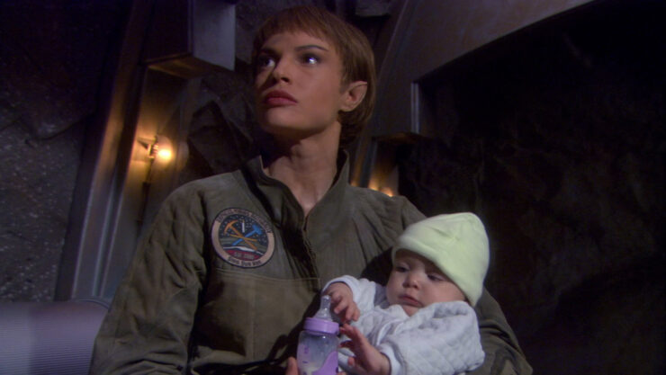 Screenshot of T'Pol holding a baby in Star Trek: Enterprise, "Terra Prime"