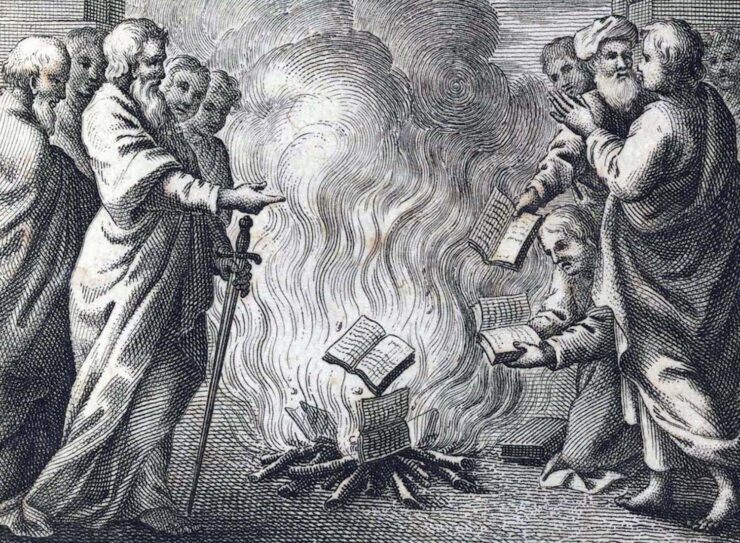 From the Index Librorum Prohibitorum: An etching depicting several robed men throwing books into a fire.