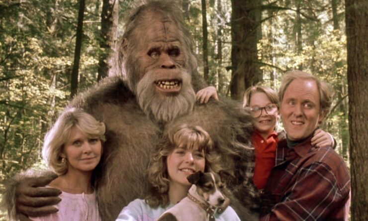 Image from Harry and the Hendersons, in which the Bigfoot "Harry" poses for a photo with the Henderson family