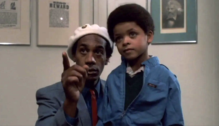 The Brother (Joe Morton) and a young boy in a scene from The Brother From Another Planet