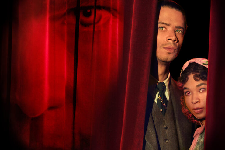 Louis and Claudia in Interview with the Vampire season 2, peeking out from behind a curtain