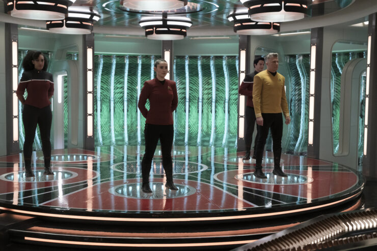 Christina Chong as La'an, Jack Quaid as Boimler, Tawny Newsome as Mariner and Anson Mount as Pike in transporter on Star Trek: Strange New Worlds, streaming on Paramount+, 2023