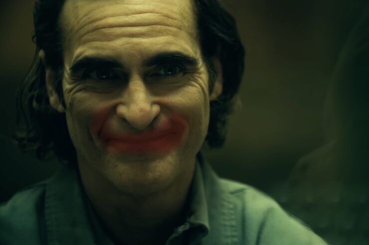 Joaquin Phoenix in Joker: Folie a Deux, smiling