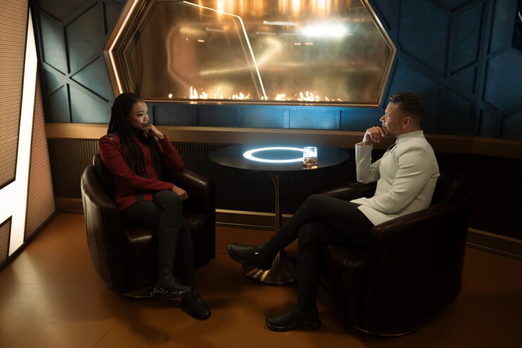 Burnham (Sonequa Martin-Green) and Culber (Wilson Cruz) sit together in a lounge in Star Trek: Discovery "Jinaal"