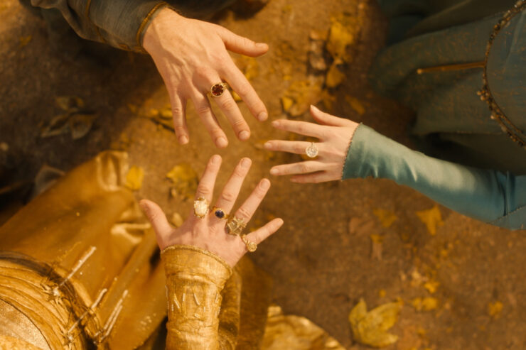 Three hands with three rings of power in season two of The Rings of Power