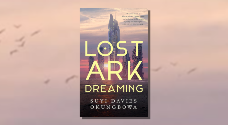 Cover of Lost Ark Dreaming, showing five derelict skyscrapers, four of them derelict, standing in water against a cloudy evening sky.