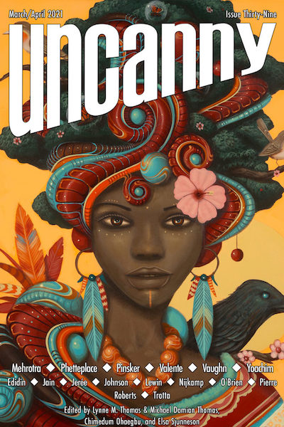 Cover of Uncanny magazine issue 39, showing a woman with a colorful headdress containing flowers, feathers and other decorations, against a yellow-orange background.