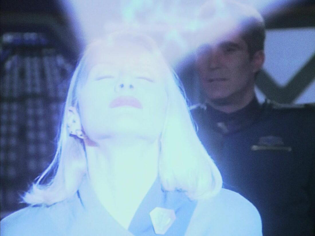 Winters receives a telepathic gift in a scene from Babylon 5 "Mind War"