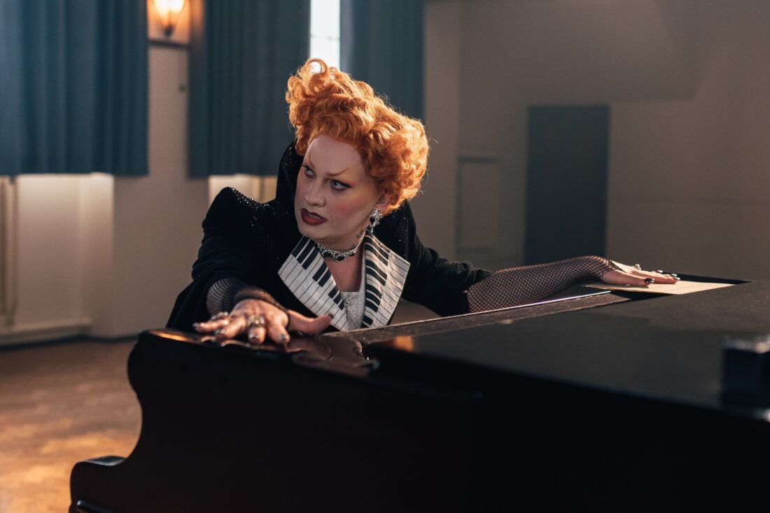 Jinkx Monsoon as Maestro on Doctor Who, "The Devil's Chord," at the piano