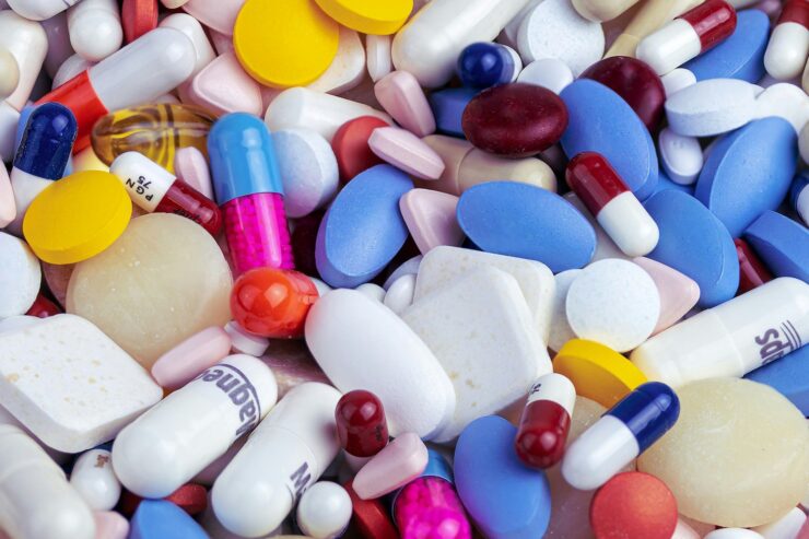 Close up pile of pills and medicine tablets