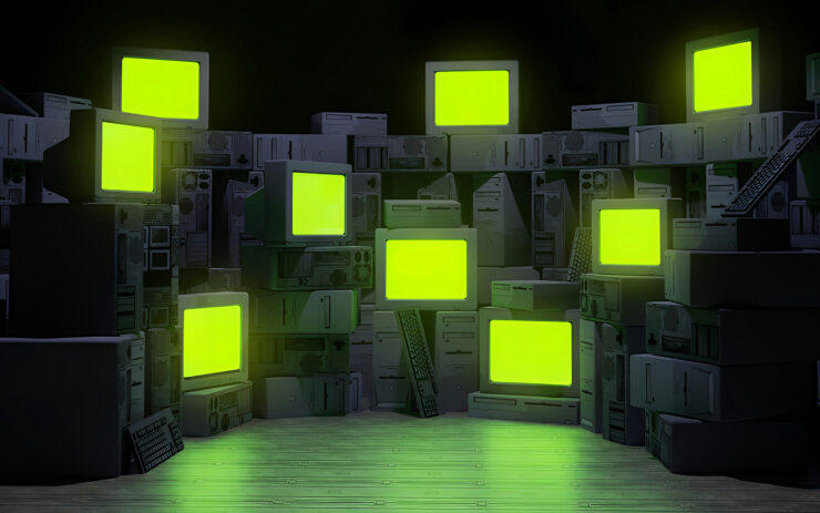 Digital image depicting a pile of old computer parts, including CPU towers, keyboards, and monitors with glowing green screens