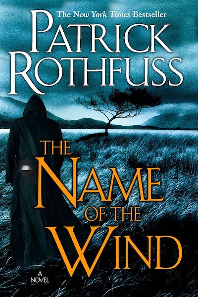 Cover of The Name of the Wind, showing a hooded figure in silhouette in a field at night.