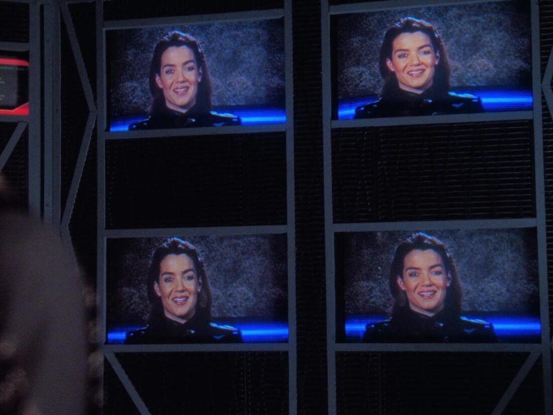 Ivanova appears on a communications video screen in a scene from Babylon 5 "Survivors"