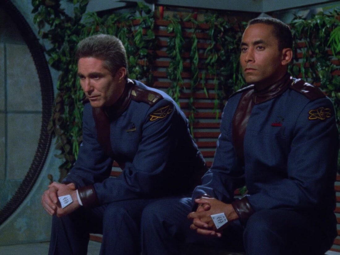 Sinclair and Franklin sit together in a scene from Babylon 5: Believers