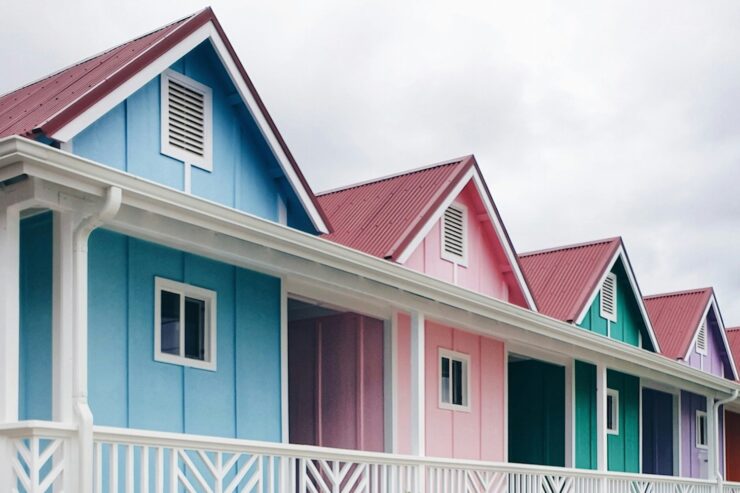 Photo of a row of brightly colored beach houses