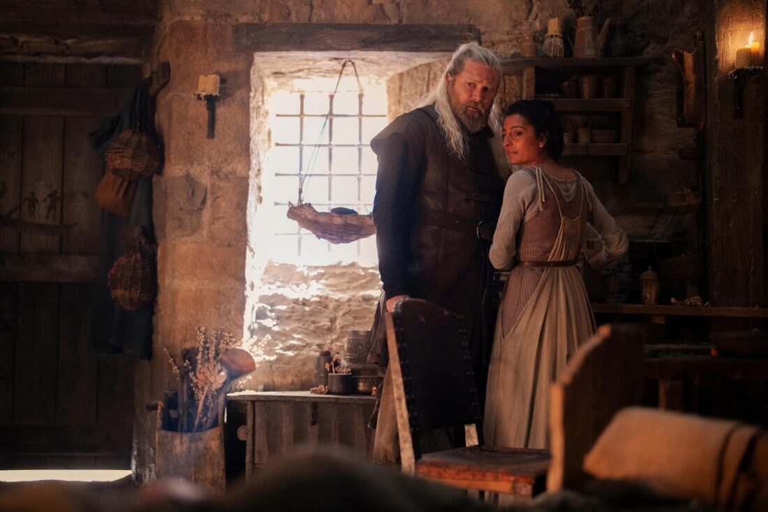 Blacksmith Hugh “Hammer” (Kieran Bew) and his wife (Ellora Torchia) in House of the Dragon, Season 2 Episode 2