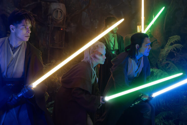 Yord Fandar (Charlie Barnett), Jedi Padawan Jecki Lon (Dafne Keen) and Master Sol (Lee Jung-jae) in Lucasfilm's THE ACOLYTE, with lightsabers at the ready