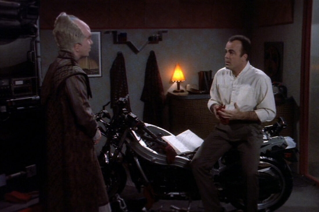 A scene from Babylon 5, "Eyes": Lennier and Garibaldi discuss Garibaldi's motorcycle.