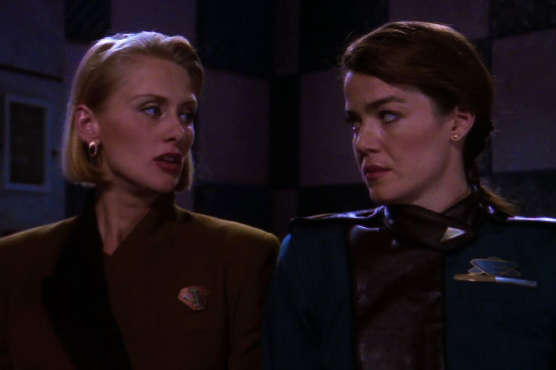 Winters and Ivanova glare at each other in a scene from Babylon 5: "Legacies"