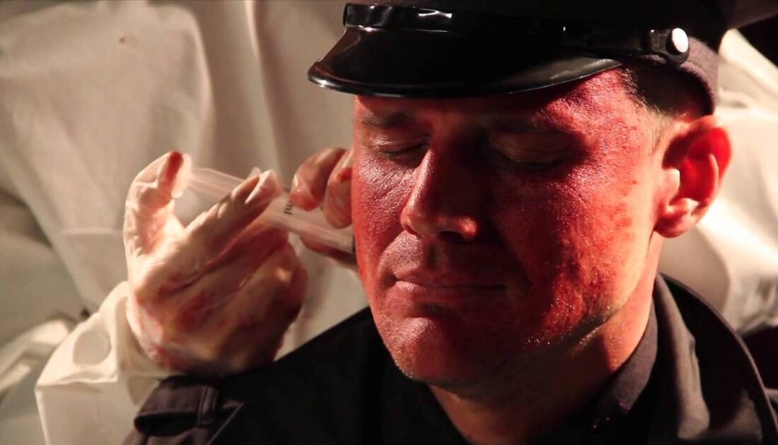 A Scene from Captain Battle: Legacy War -- Clone-Himmler (Todd James Jackson) receives an injection