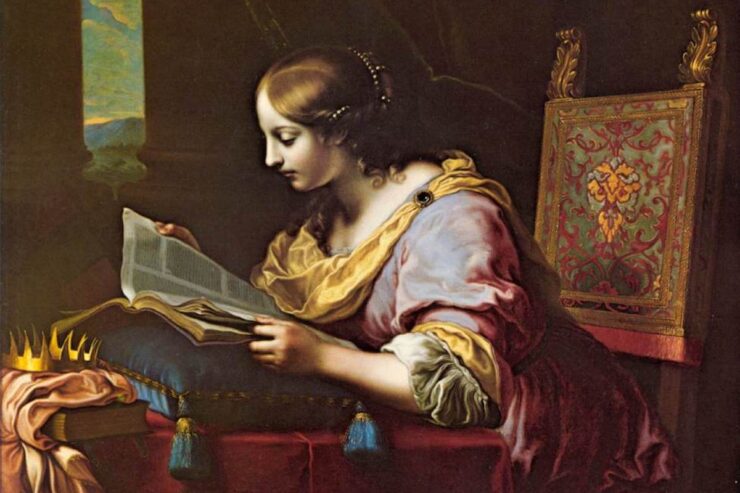 Painting of St Catherine seated at a table, reading a book that rests on a tasseled cushion