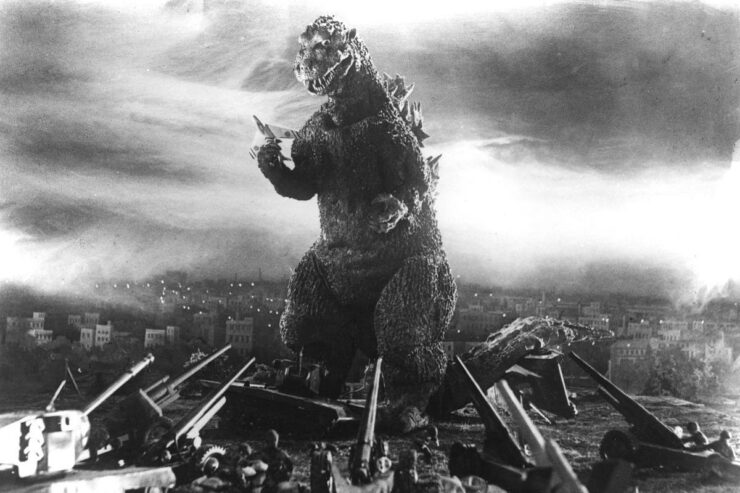 Godzilla, surrounded by cannons in a scene from Godzilla (1954)