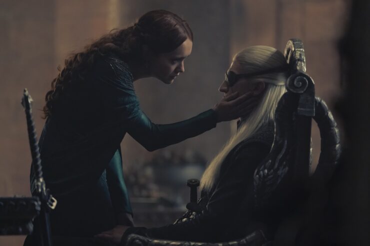 A scene from House of the Dragon season 2 episode 6: Alicent (Olivia Cooke) places her hand on Aemond's (Ewan Mitchell) face