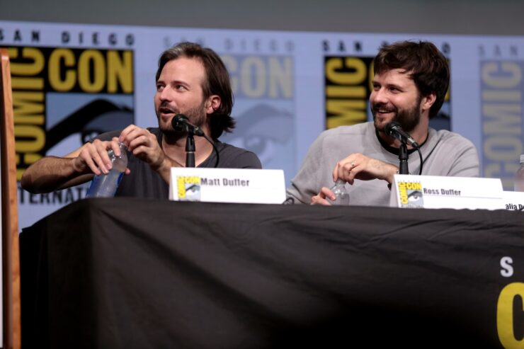 The Duffer Brothers at San Diego Comic-Con, sitting on a panel