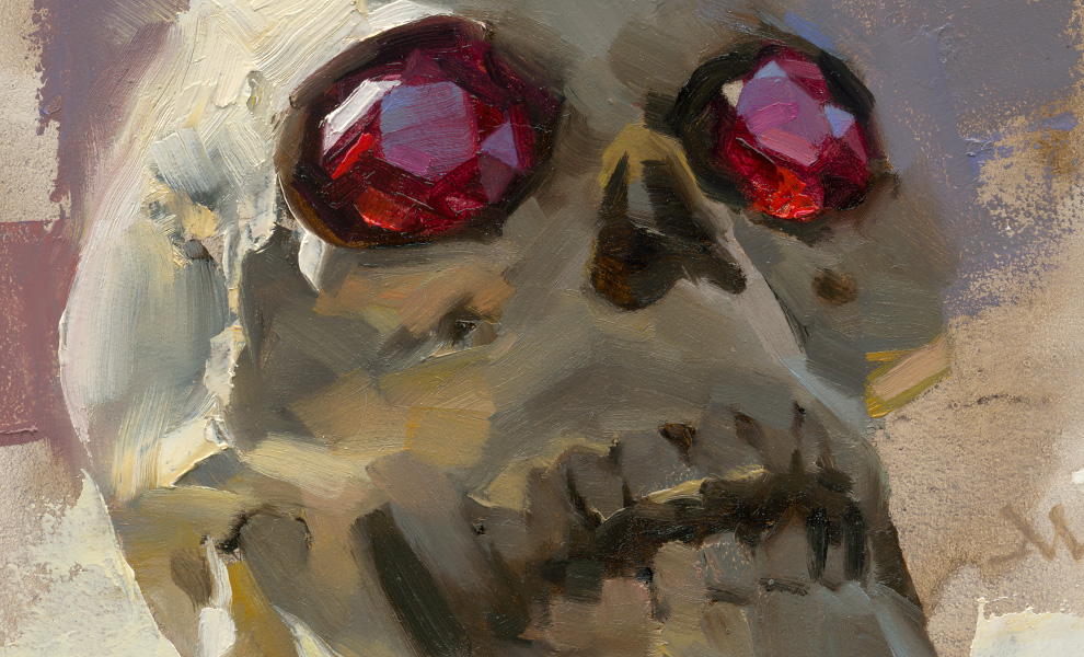 An illustration of a skull with gleaming rubies for eyes.